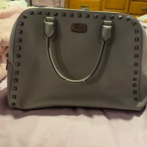 Medium size grey Michael Kors purse